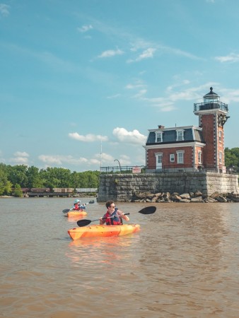 Kayaking in the Hudson River by Hudson Athens Lighthouse